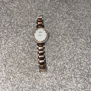 Rose gold and silver watch